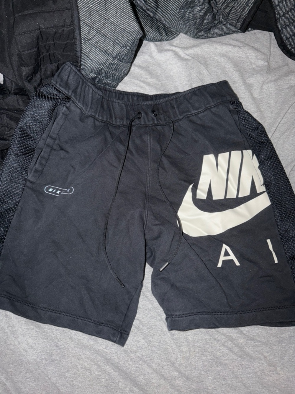 Nike Men’s Black Athletic Shorts with Large White Swoosh